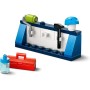LEGO City Sin Límites: Rampa de Aceleración para Coches de Carreras de Juguete con 4 Minifiguras, 2 Autos Locos de Perrito