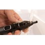 Recortador de nariz, orejas y cejas Philips Series NT5650/16 5000 que funciona con pilas, negro (paquete de 1), Unisex adultos
