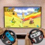 Orzly Pack De Dos Volantes para Usar con los Joy-con de Nintendo Switch – Negro [con luz indicando Jugador]