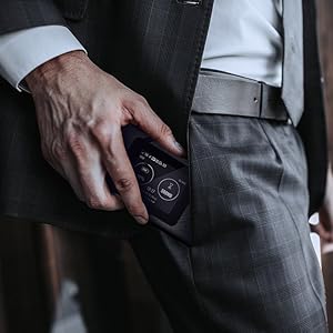 A man taking the DWR-2101 5G Wi-Fi 6 Mobile Hotspot out of his pocket.