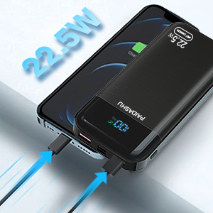 Dispositivo electrónico portátil negro con pantalla LED y puertos USB, que muestra un efecto de texto azul de «2,5 W»