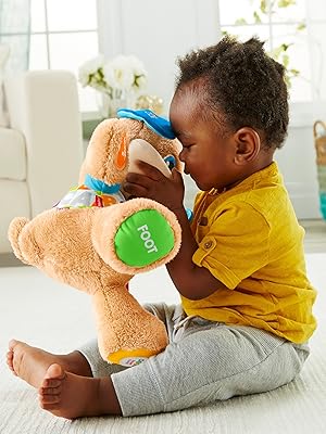 Fisher Price bebes peluches motricidad sensorial primeros descubrimientos perrita