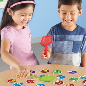 children playing with Sight Word Swat sight word game