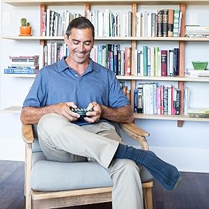 Man playing with Brainbolt the electronic memory game