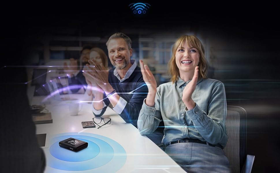 DWR-2101 5G Wi-Fi 6 Mobile Hotspot on a table in a meeting room surrounded by employees.