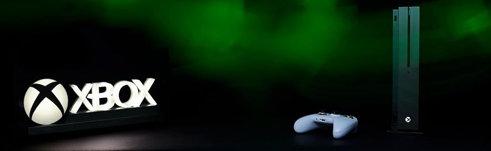 Xbox luz junto al controlador y la consola de juegos